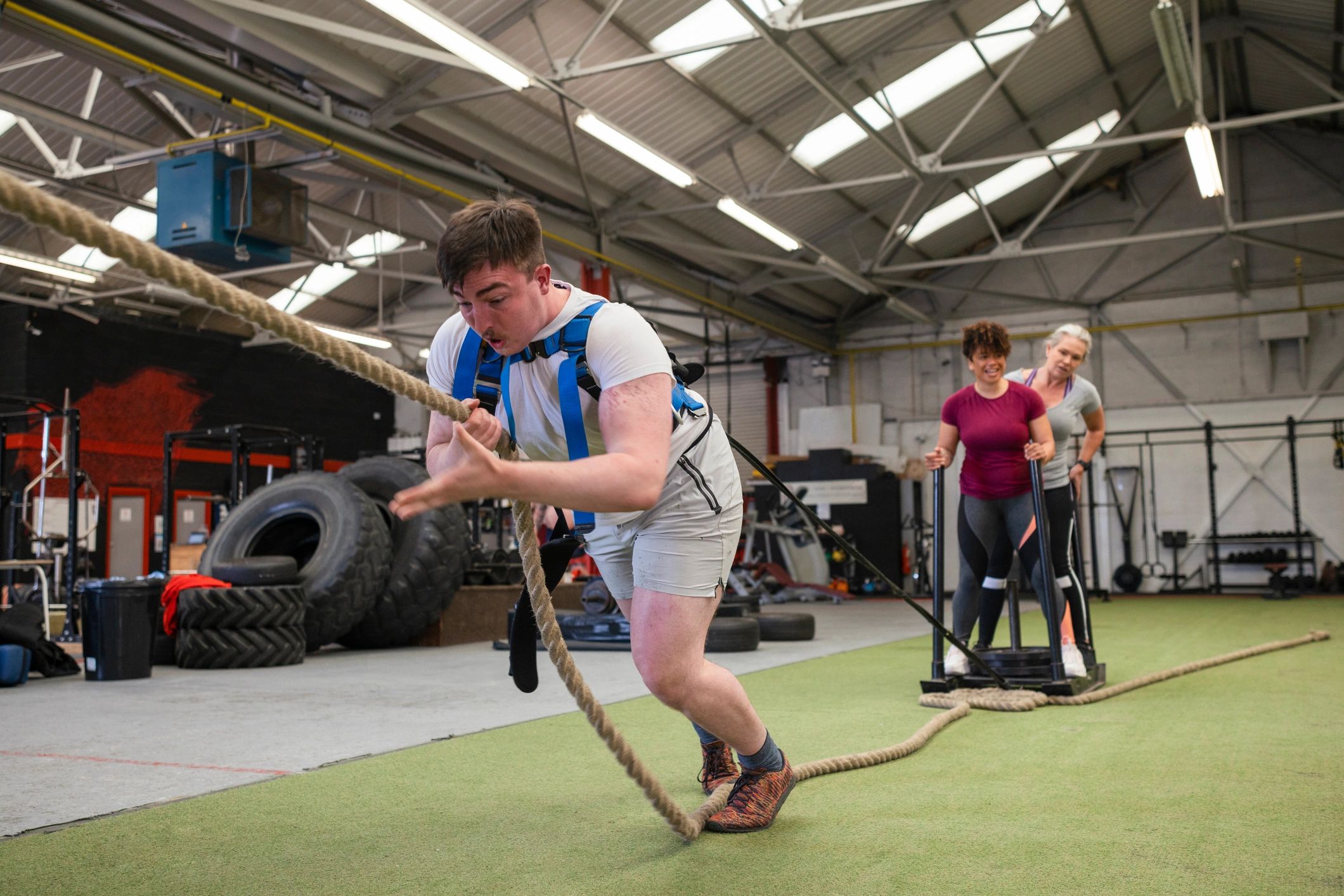 Athletes doing strength work in the gym